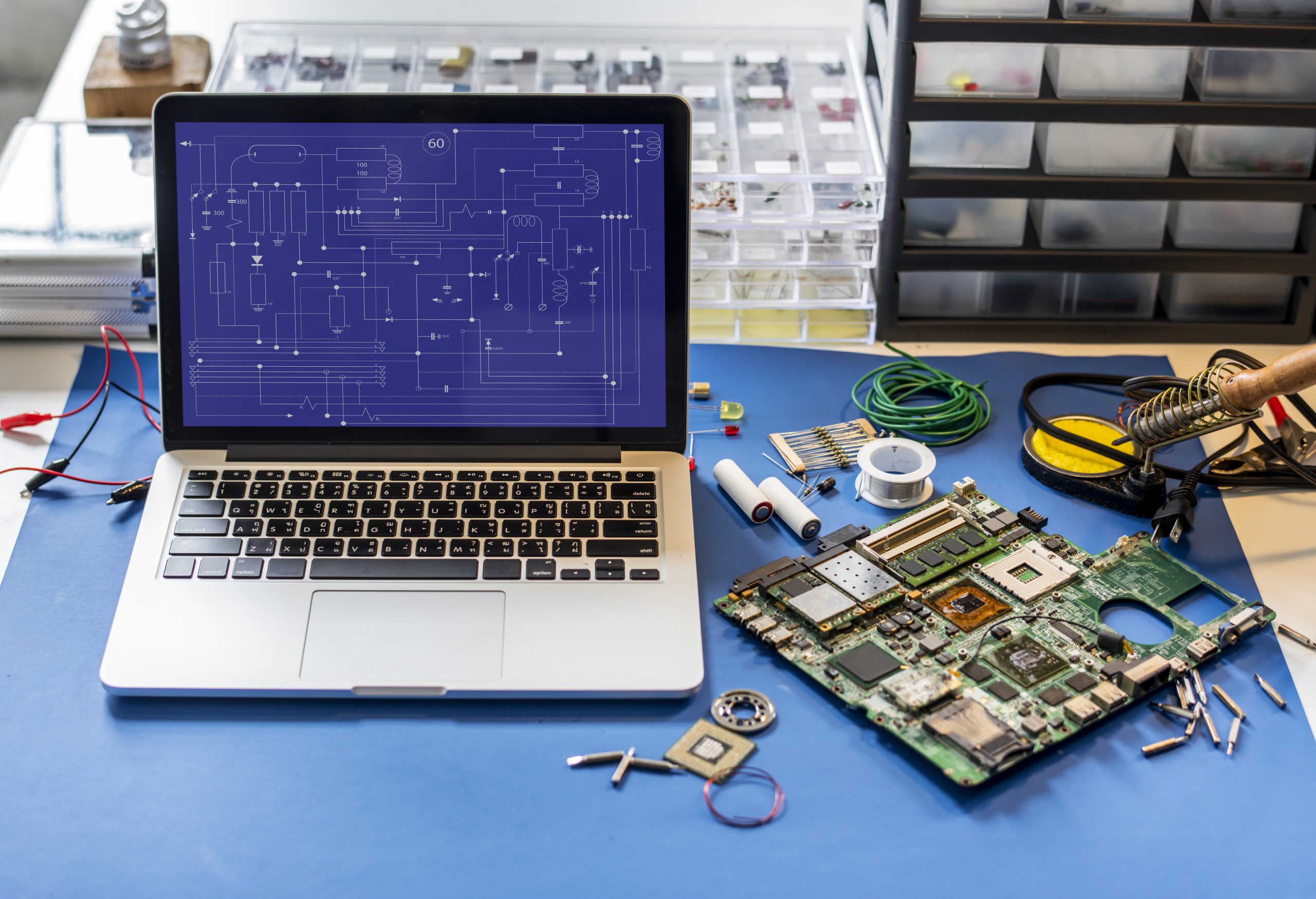 INSIGHTS Computer laptop showing electronic circuit pattern